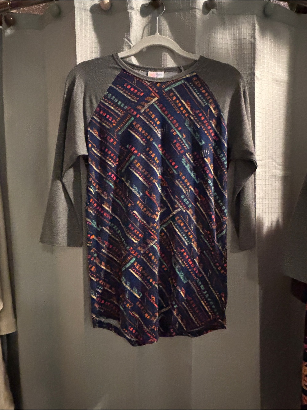 LuLaRoe Navy Tunic with Orange, Teal & Pink Geometric Print